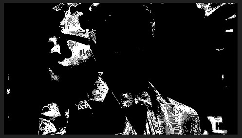 Black and white silhouette of Leonardo DiCaprio toasting.